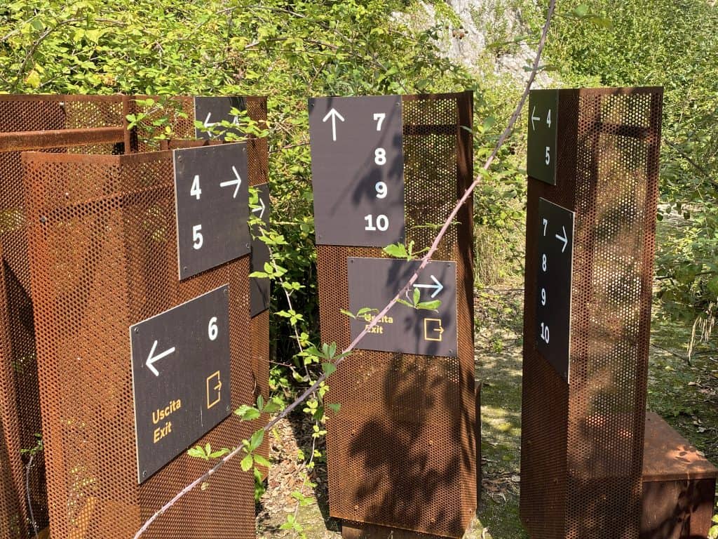 Signs at the Neapolis Archaeological Park in Syracuse, Sicily, Italy