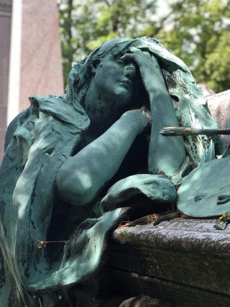 A beautiful statue at Pere Lachaise Cemetery
