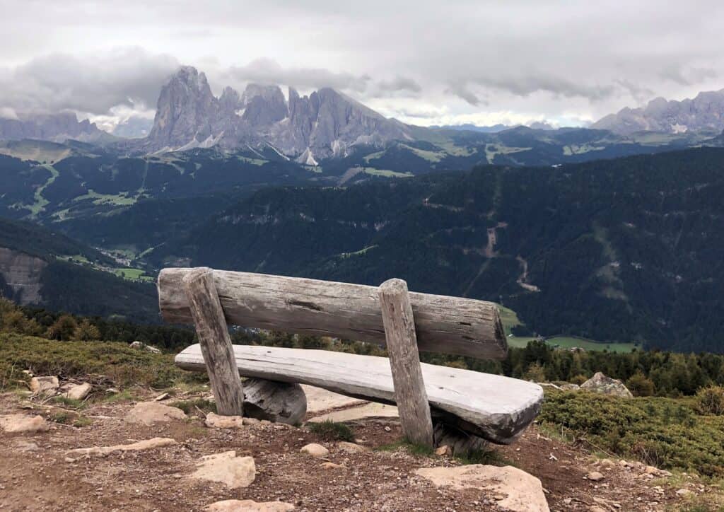 Bench with view over mountains. Easy to get to from Ortisei Italy

