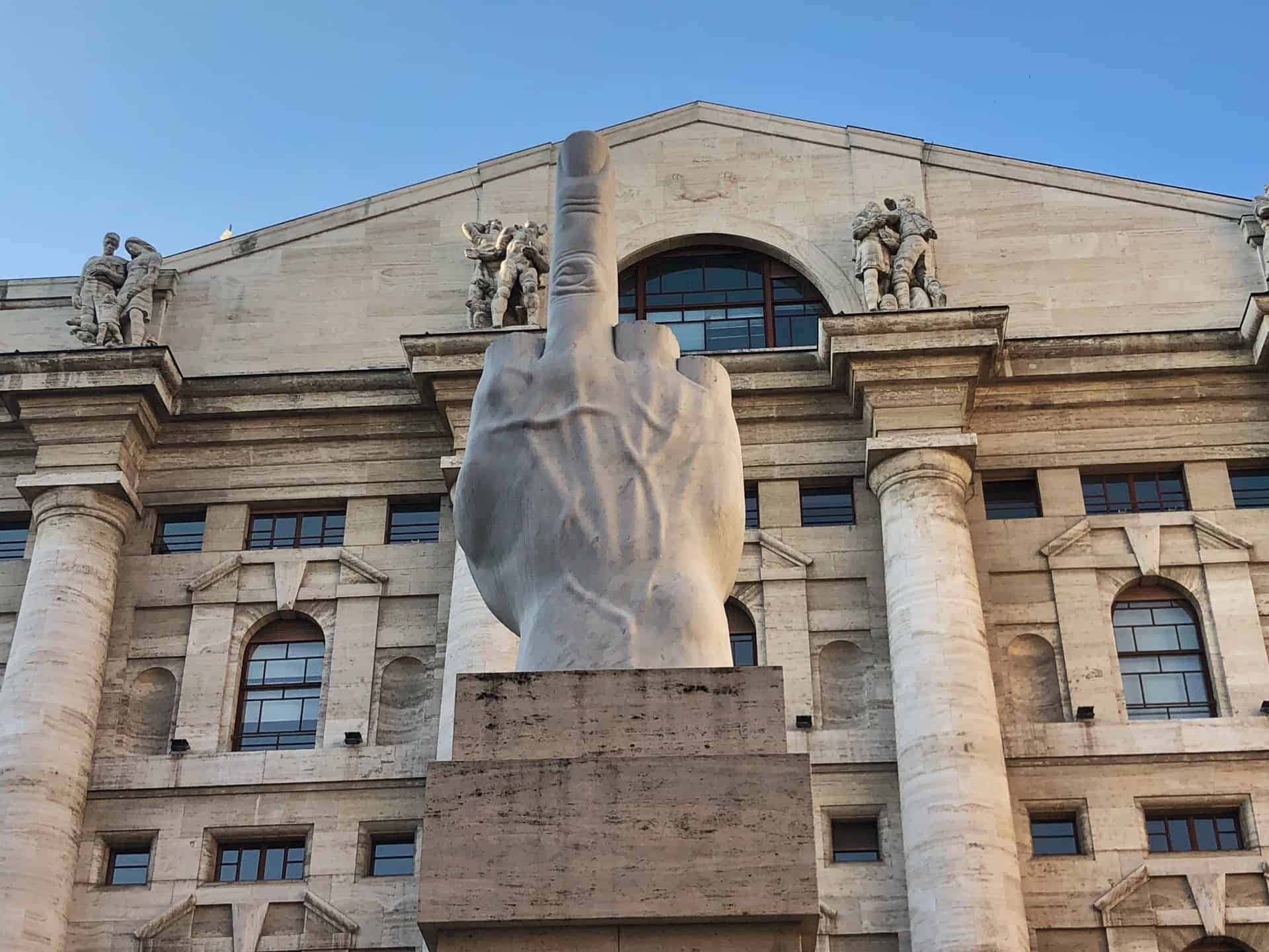 The LOVE statue in Milan. A middle finger pointing at the Italian stock exchange