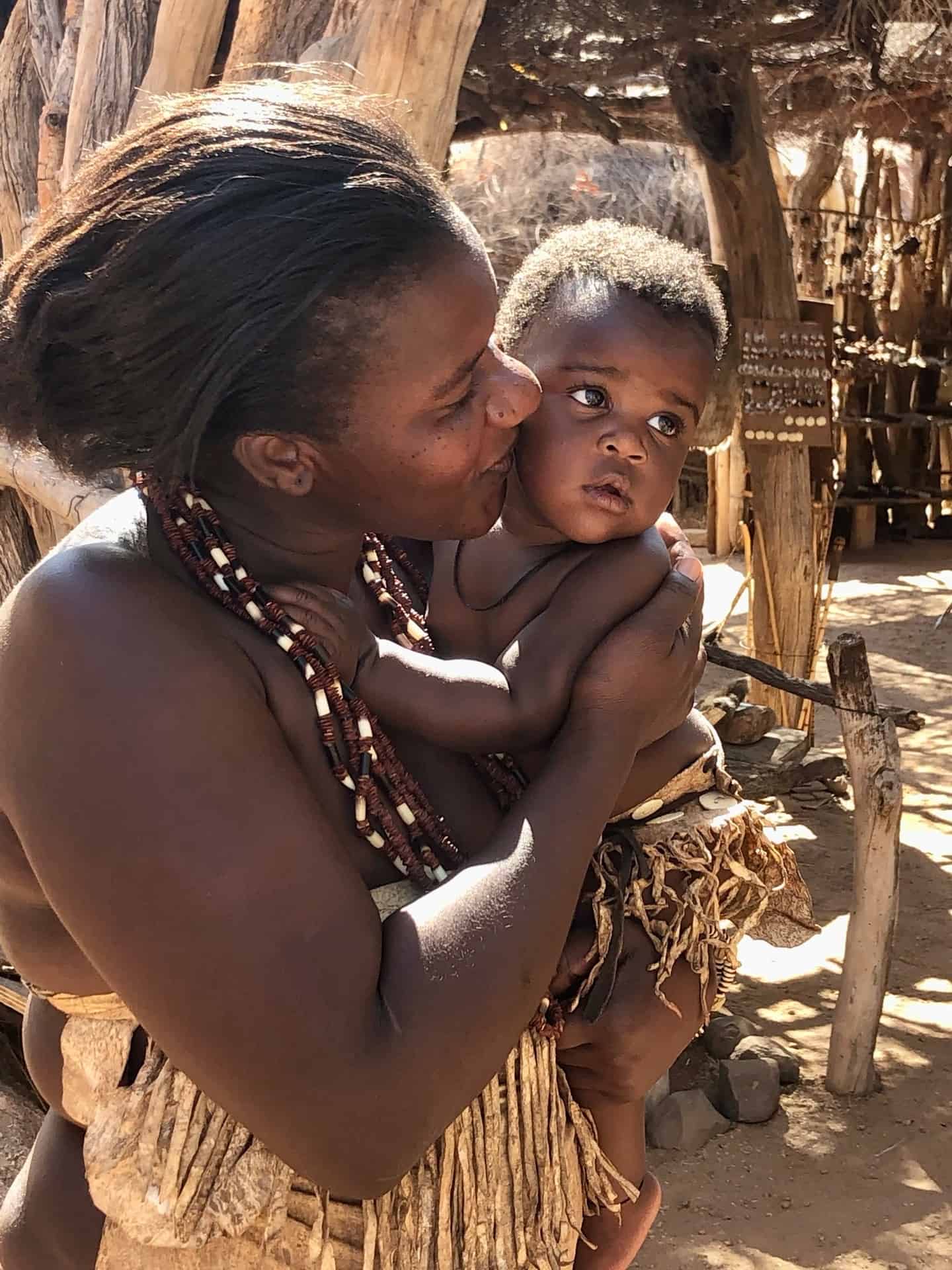 A mum and baby from the Damara Cultural village in Namibia 