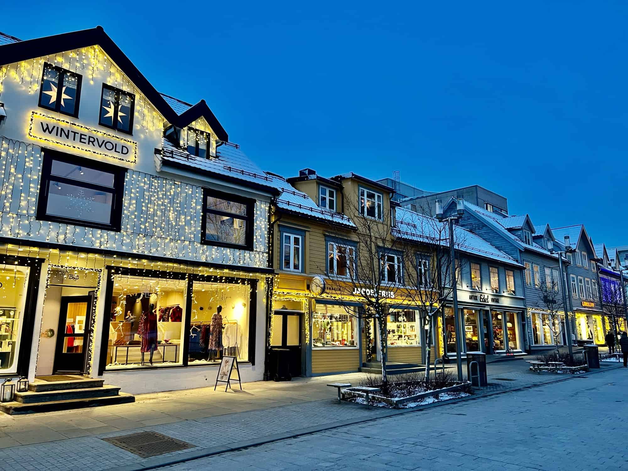 The main street of Tromso. Shops with bright lights - not ideal for spotting the Northern lights
