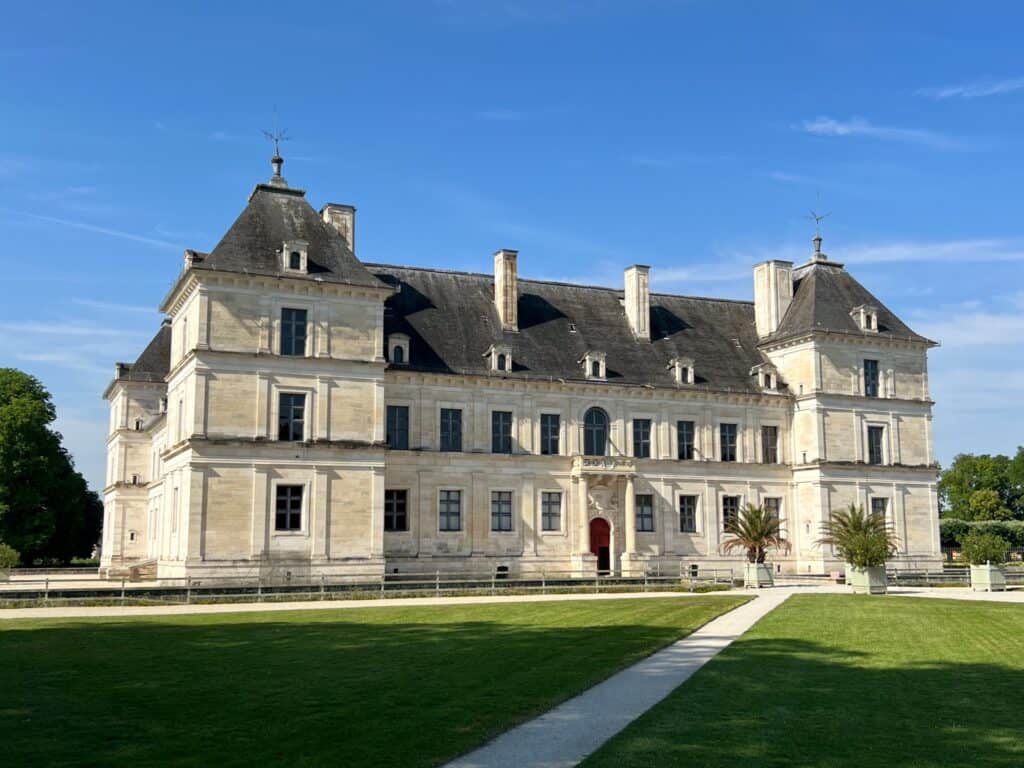 16th-century Château d'Ancy-le-Franc with blue sky 
