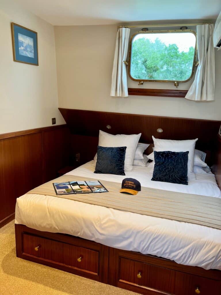 Double bed in cabin on La Belle Epoque 
