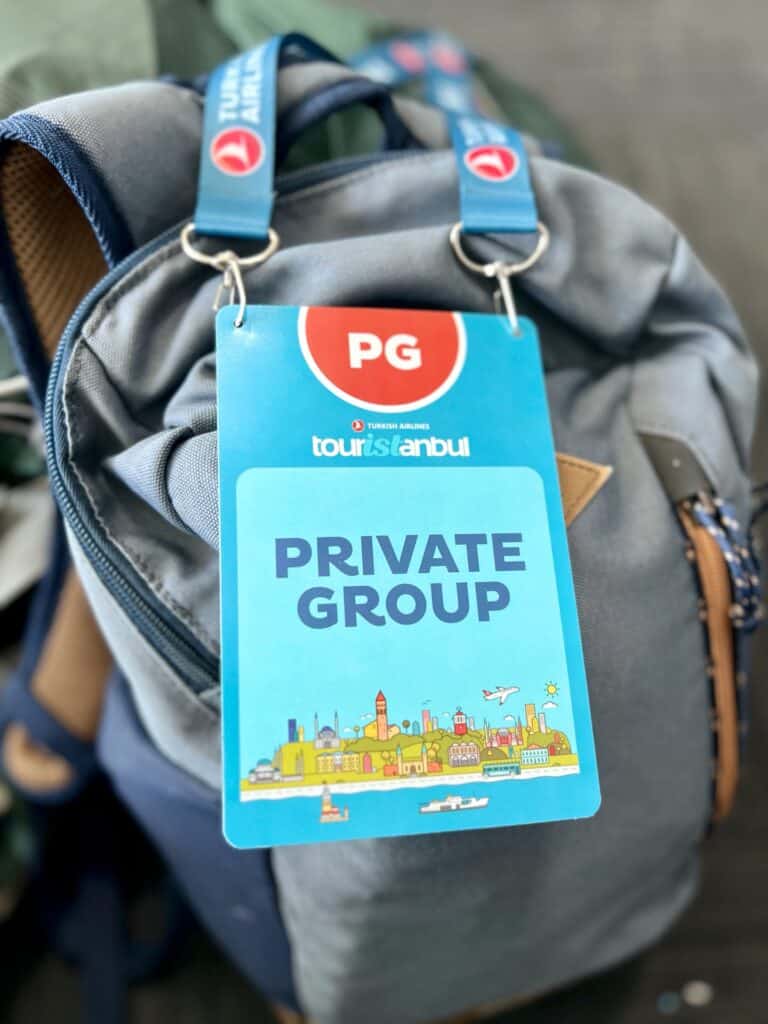 Blue luggage label stating Private Group tour for my long layover at Istanbul Airport 