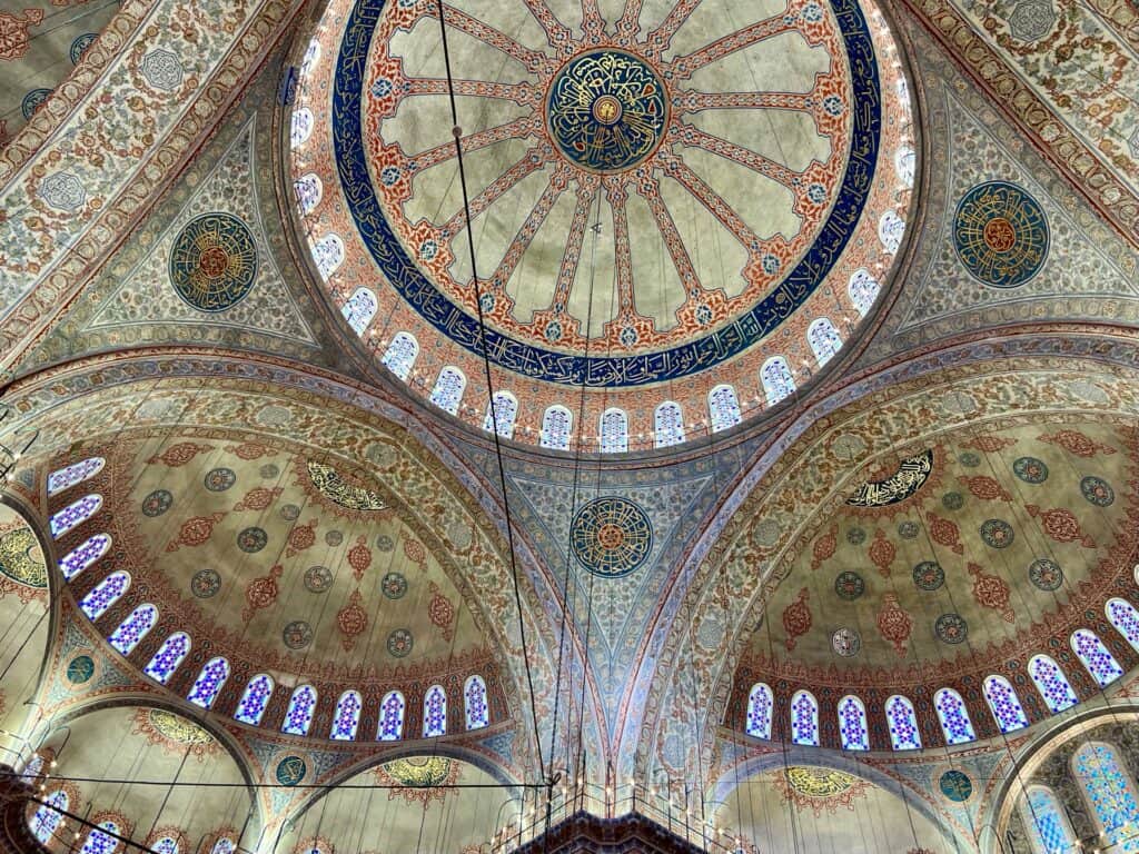 The stunning ceiling inside the blue mosque seen on my long layover at Istanbul