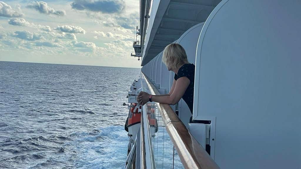 Looking over a balcony at the ocean on a cruise from Montreal to Fort Lauderdale