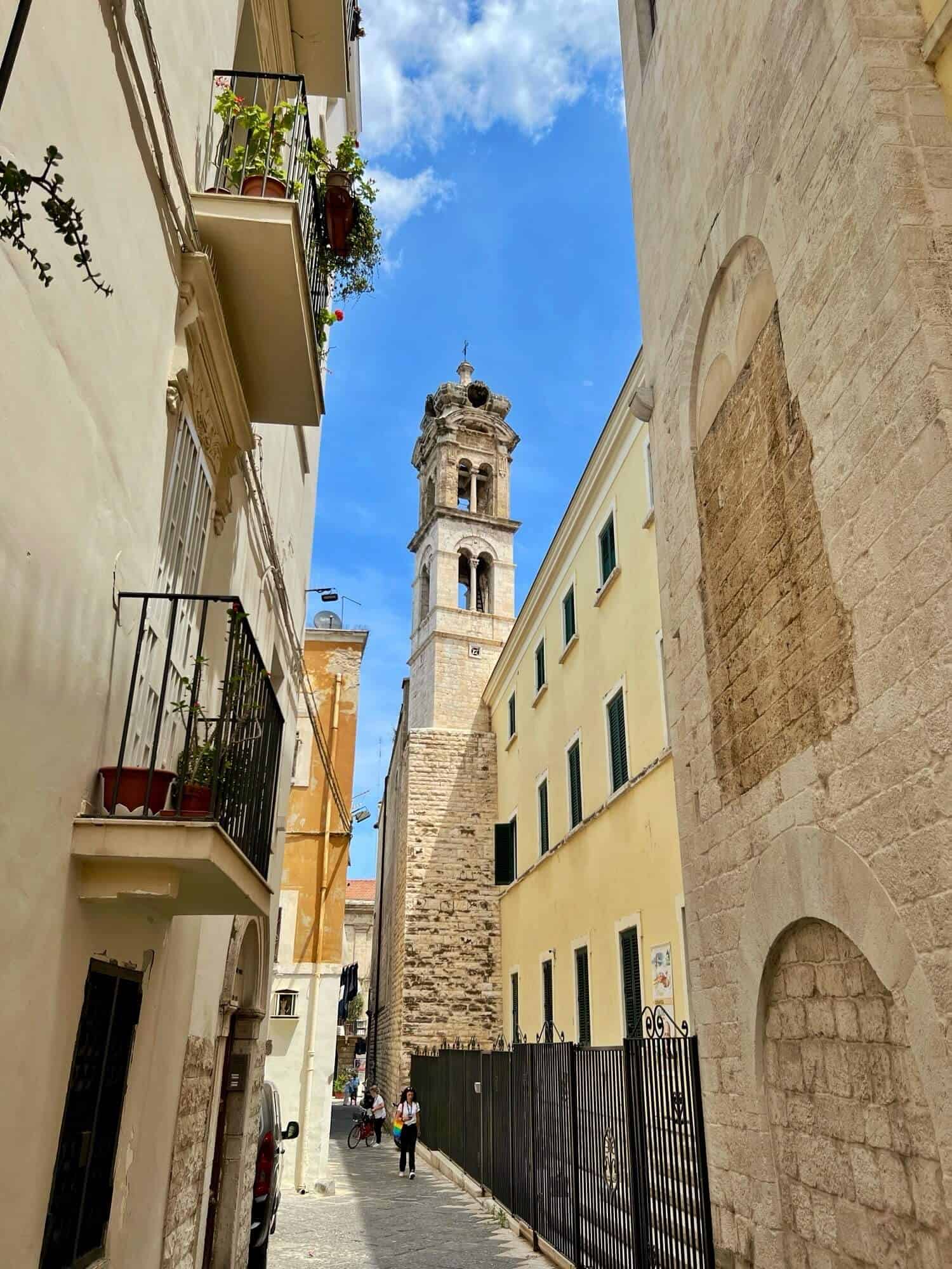 Narrow alleyway leading to Bari's bell tower 