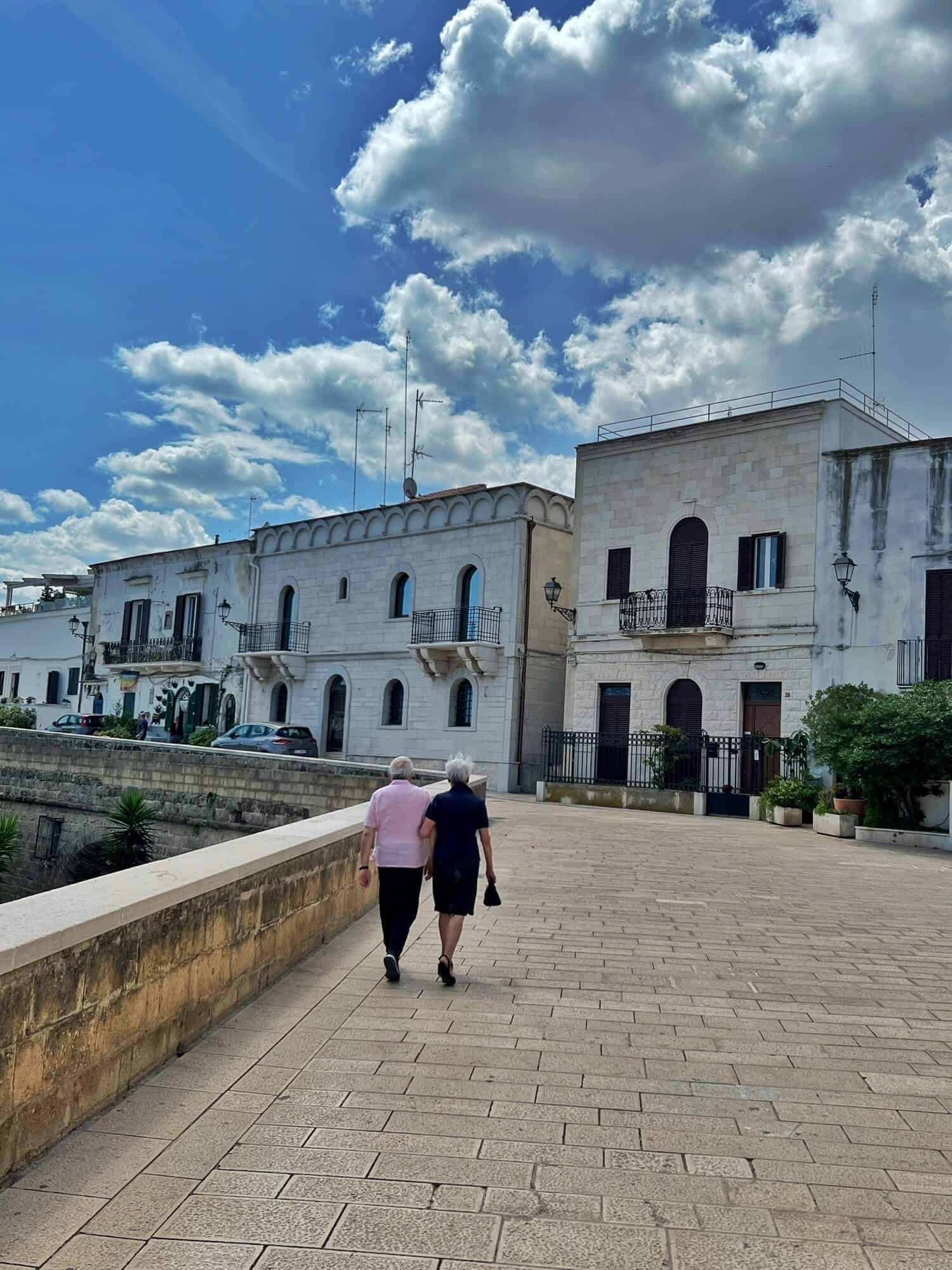 Elderly Couple Taking A Stroll Along The Walls of Bari 