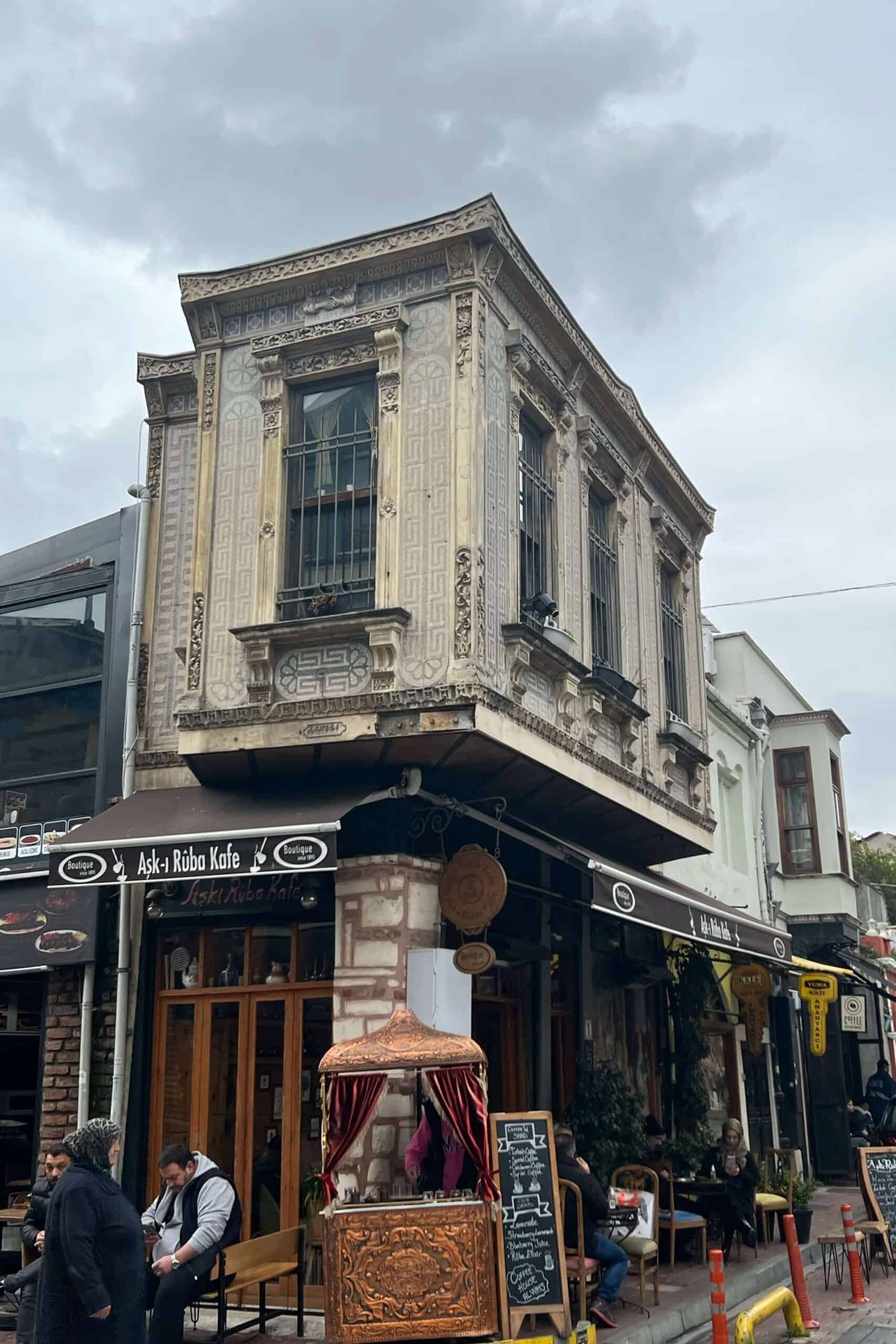 An old cafe with a Turkish coffee stand in front 