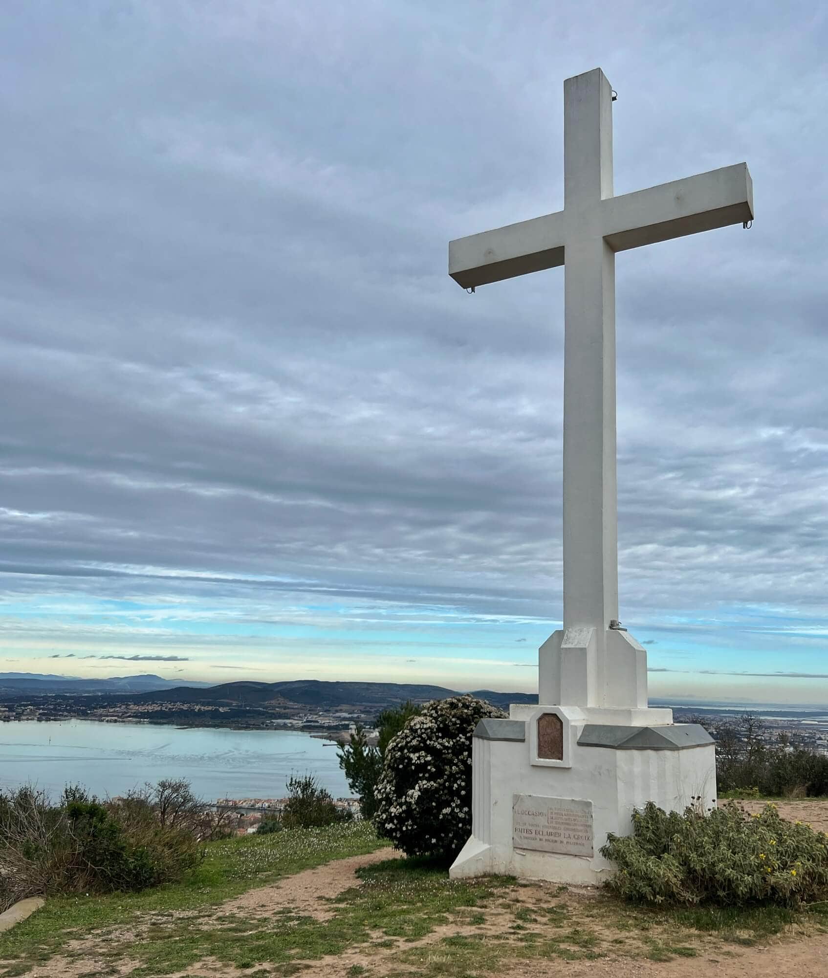A large white cross on top go mont st Clair in Sete 