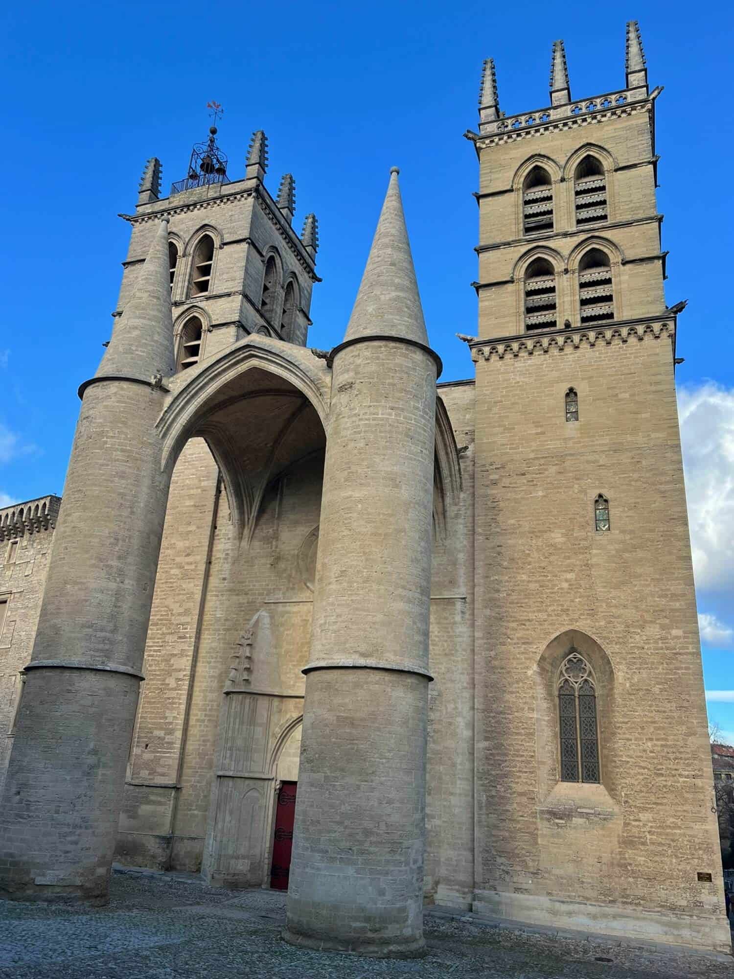 Catherdral in Montpellier with two bell towers and two pointy towers