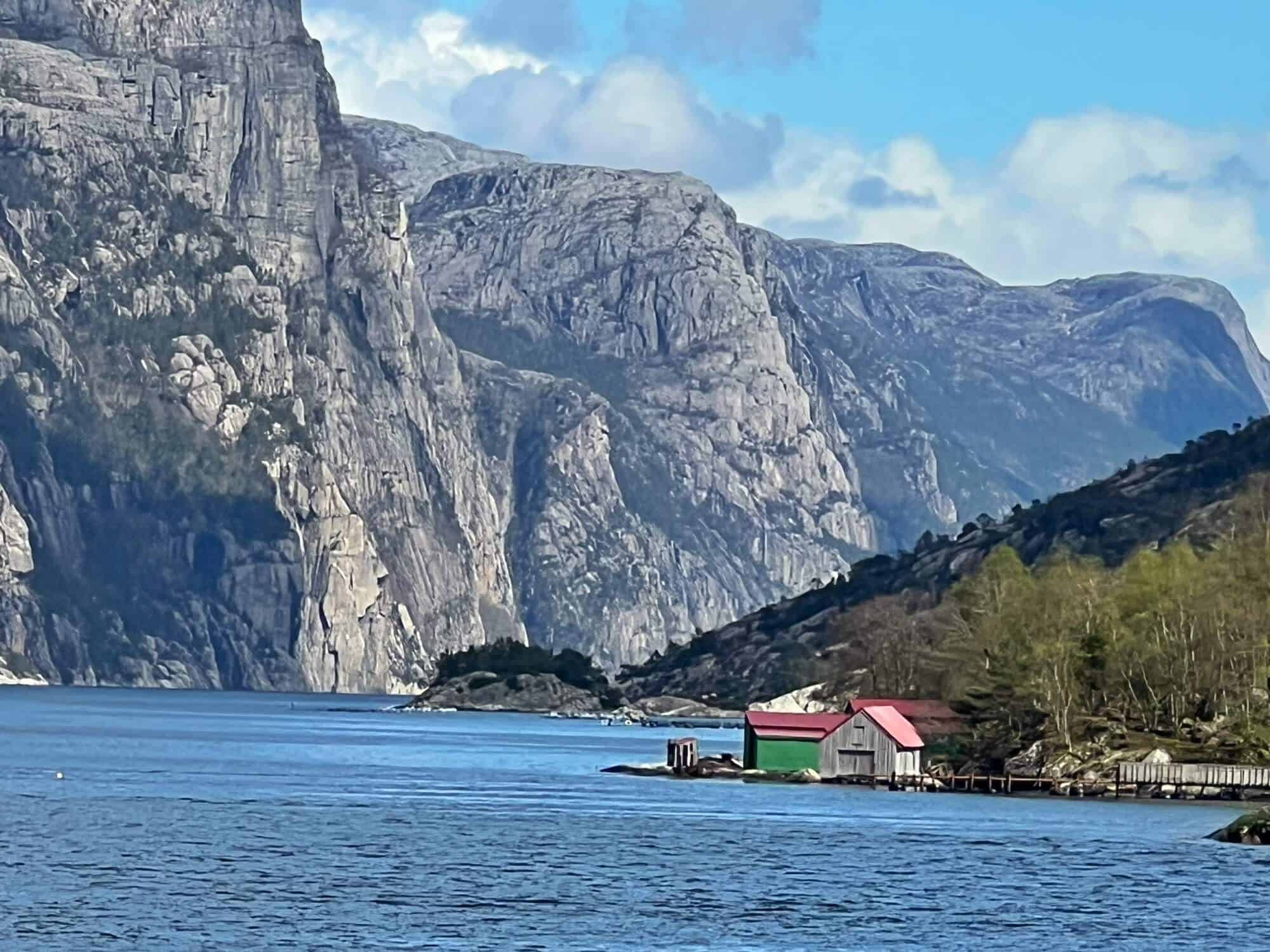View of fjord beneath blue sky