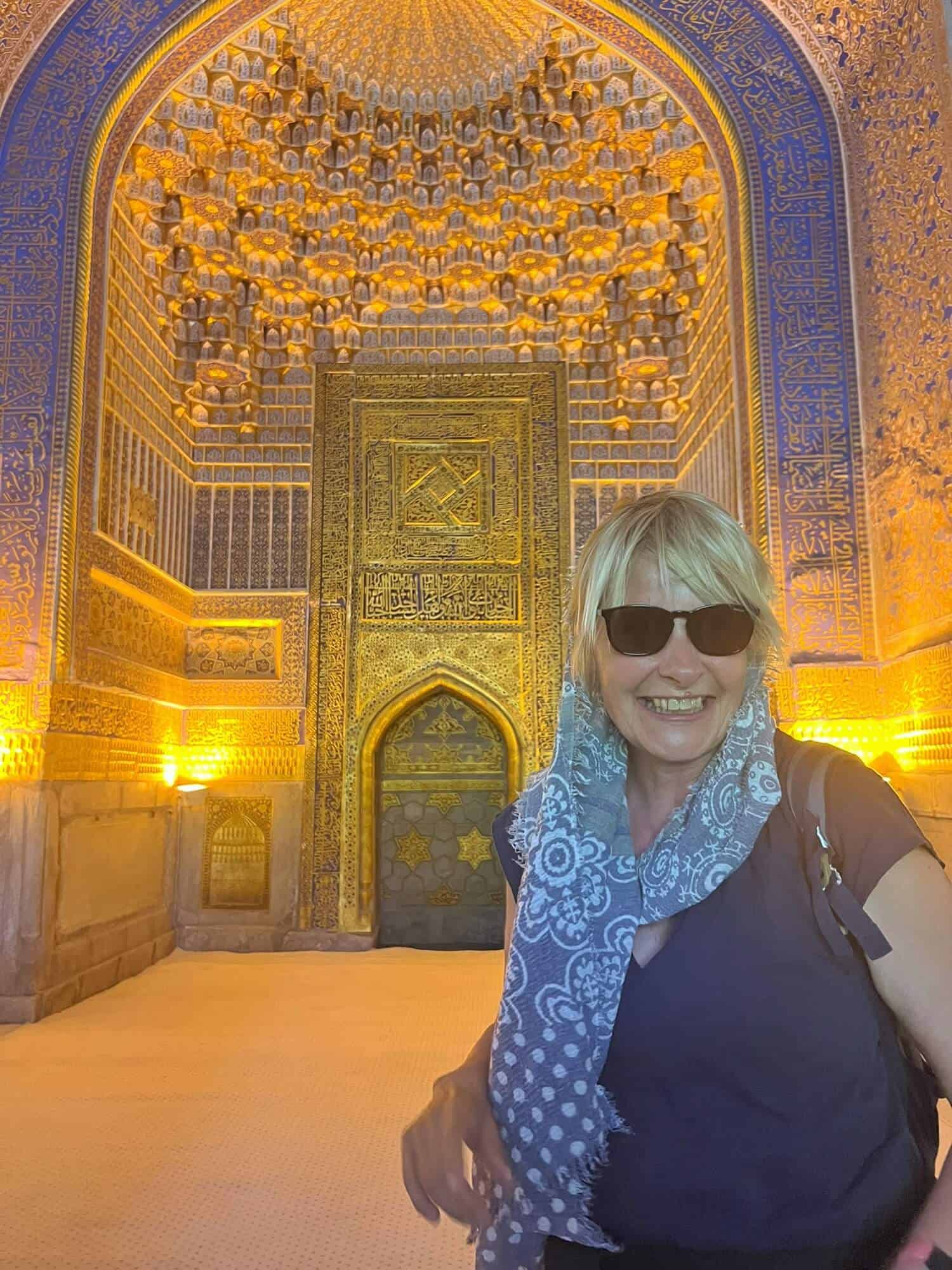 Woman wearing a head scarf and sunglasses 