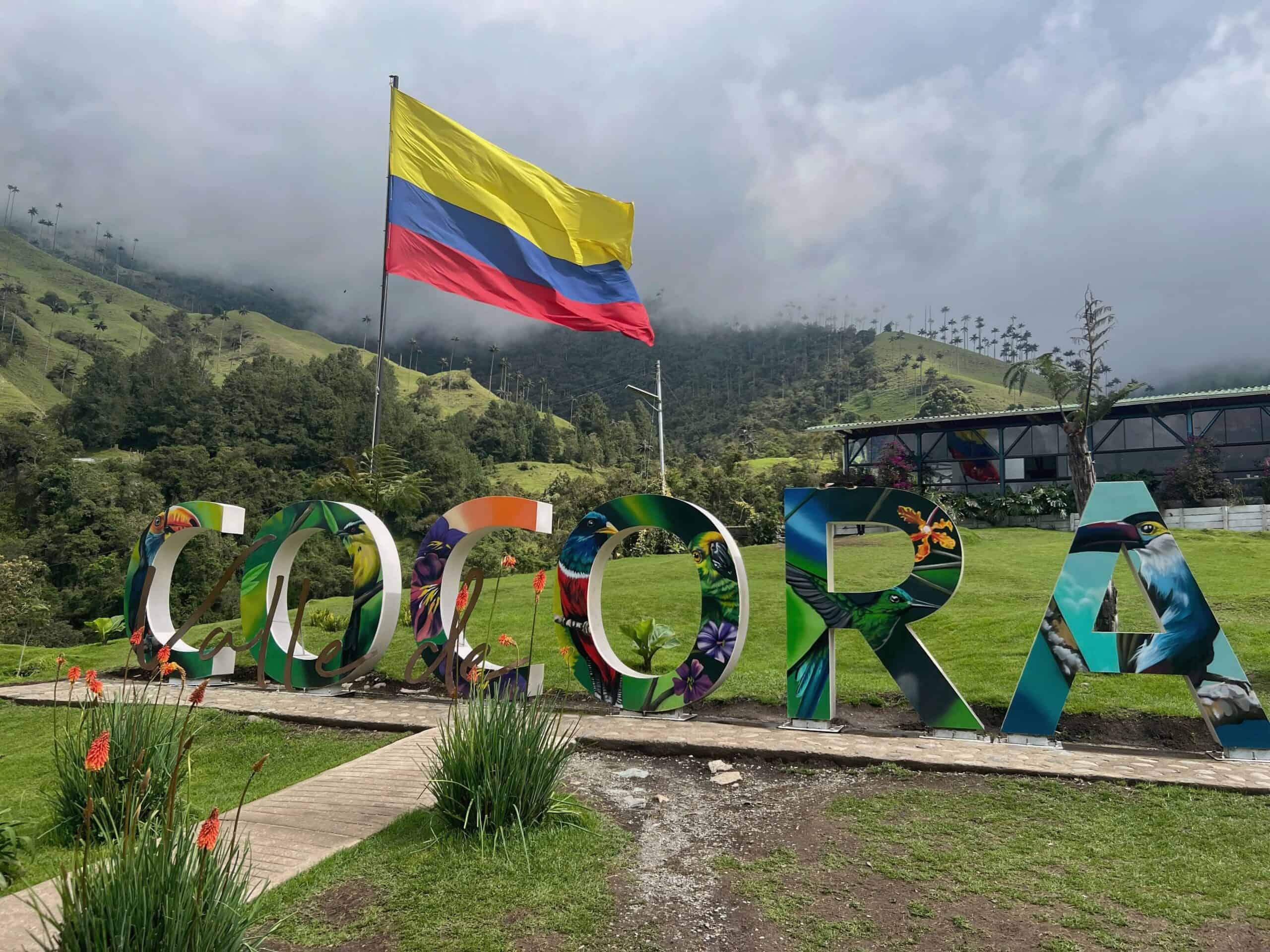 Colombian flag and the Cocora Valley sign 