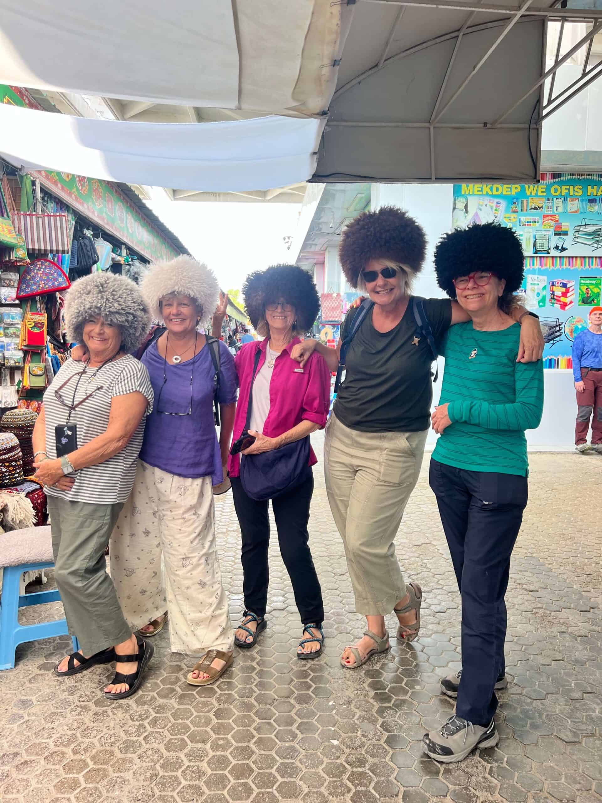 wearing telpek hats in the market Turkmenistan