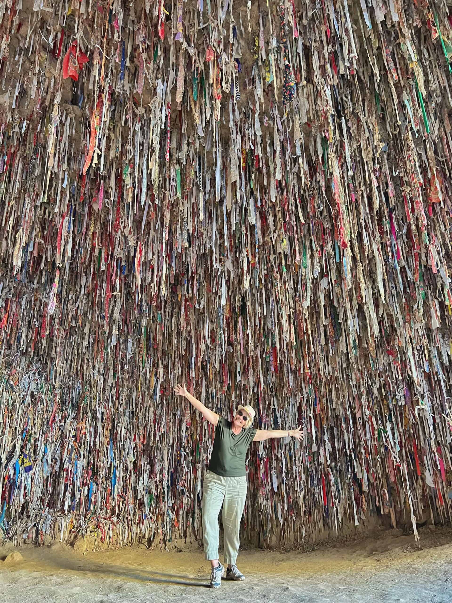 standing in the cave filled with fabric in Turkmenistan